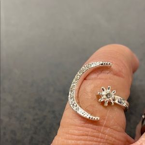 Silver moon and star ring.